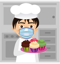 Chef With Cupcakes Wearing Protective Mask