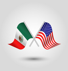 Crossed American And Mexican Flags On Silver Pole