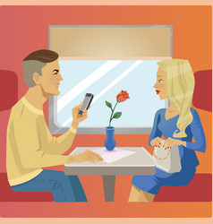 Man And Woman Sit Near Window At Train Restaurant