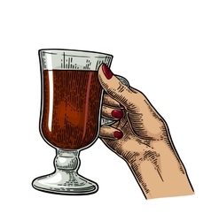 Female Hand Holding A Glass Of Cocktail Wine