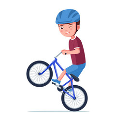 Boy Rides A Bmx Bike On Rear Wheel