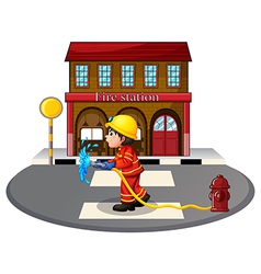 A Fireman Holding Hose