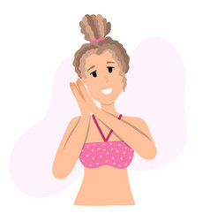 Young Woman In The Swimsuit And Top Knot Bun Is