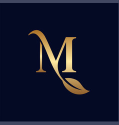 Gold Logo M With Leaf