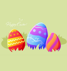 Three Colored Decorated Easter Eggs In The Grass