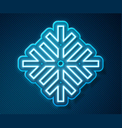 Glowing Neon Line Snowflake Icon Isolated On Blue