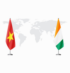 Vietnam And Ivory Coast Flags For Official Meeting