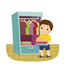 Boy Putting Stack Folded Clothes In Closet