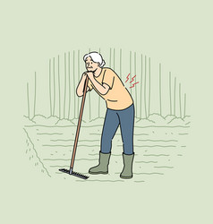 Elderly Woman Farmer With Bad Back Stands On