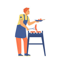 Man In Apron Cooks Sausages On Grill Or Barbecue