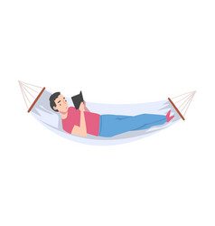 Young Male Lying In Hammock And Reading Book