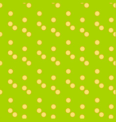 Green Surface With Yellow Polka Dots Ornament