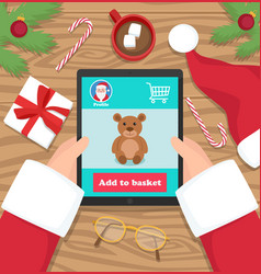 Santa Claus Buying Gifts For Kids On His Tablet