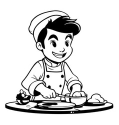 A Young Male Chef Cooking In The Kitchen