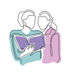 Two Women Looking At A Book