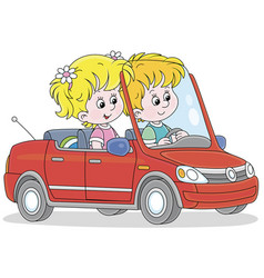 Little Girl And Boy Driving A Toy Car