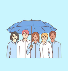 Smiling Employees Stand Together Under Umbrella