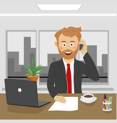 Young Business Man Talking On Phone In Office