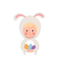 Cute Boy In Bunny Costume Holding Colored Easter