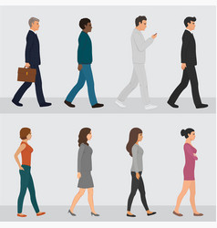 Profile Of Various People Walking Down