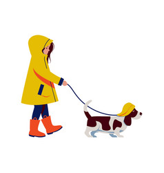 Girl In Yellow Raincoat And Rubber Boots Has