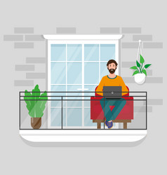 Man With Laptop On Balcony