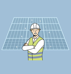 Engineer In Uniform Near Solar Panels