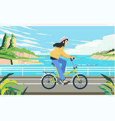 A Woman Rides Bicycle Along Seaside Road