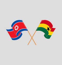 Crossed And Waving Flags Of North Korea And Ghana