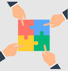 Business Hands Putting Puzzle Pieces Together