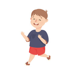 Happy Boy Running Wearing Red Shorts And Blue T