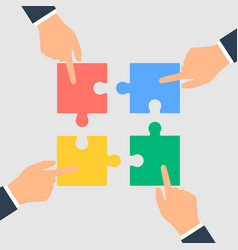 Business Hands Putting Puzzle Pieces Together