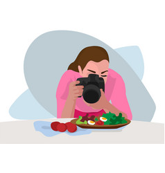 Female Blogger Cooking And Take Pictures Of Food