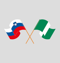 Crossed And Waving Flags Of Nigeria And Slovenia