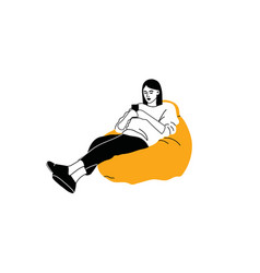 Woman Sitting On Sofa Pouf Holds Smartphone In Her