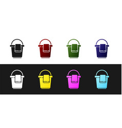 Set Bucket With Rag Icon Isolated On Black And