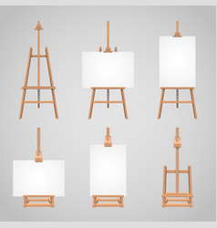 Set Of Canvases Standing On Wooden