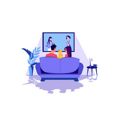 A Couple Watching Tv In The Living Room