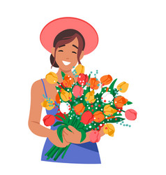 Happy Woman Holds Summer Flowers In Her Hands