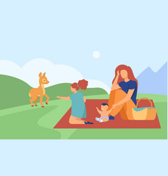 Mother With Two Children Relaxing On Nature