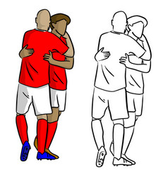 Male Soccer Players Celebrating Goal With Hug