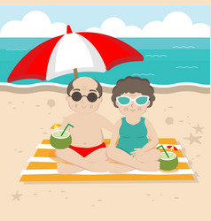 Senior Couple Relaxing On Beach