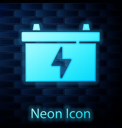 Glowing Neon Car Battery Icon Isolated On Brick