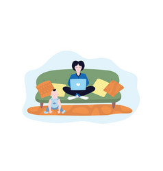 Young Mother Sitting On Sofa With Laptop