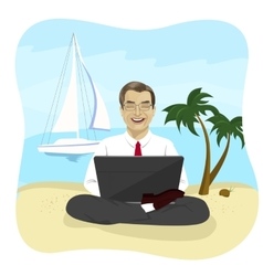 Businessman Using Laptop On Tropical Beach