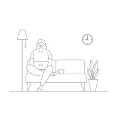 A Woman Is Sitting On Sofa Working At Home