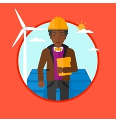 Male Worker Of Solar Power Plant And Wind Farm