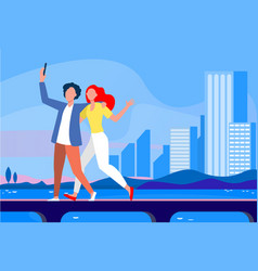 Young Couple Taking Selfie On Bridge