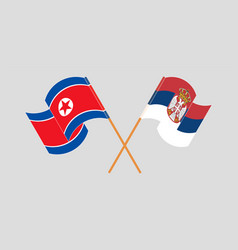 Crossed And Waving Flags Of North Korea And Serbia