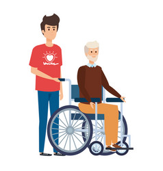 Young Man Volunteer With Old In Wheelchair